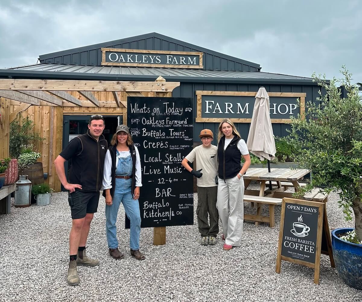 The team with the What's On board outside the Farm Shop