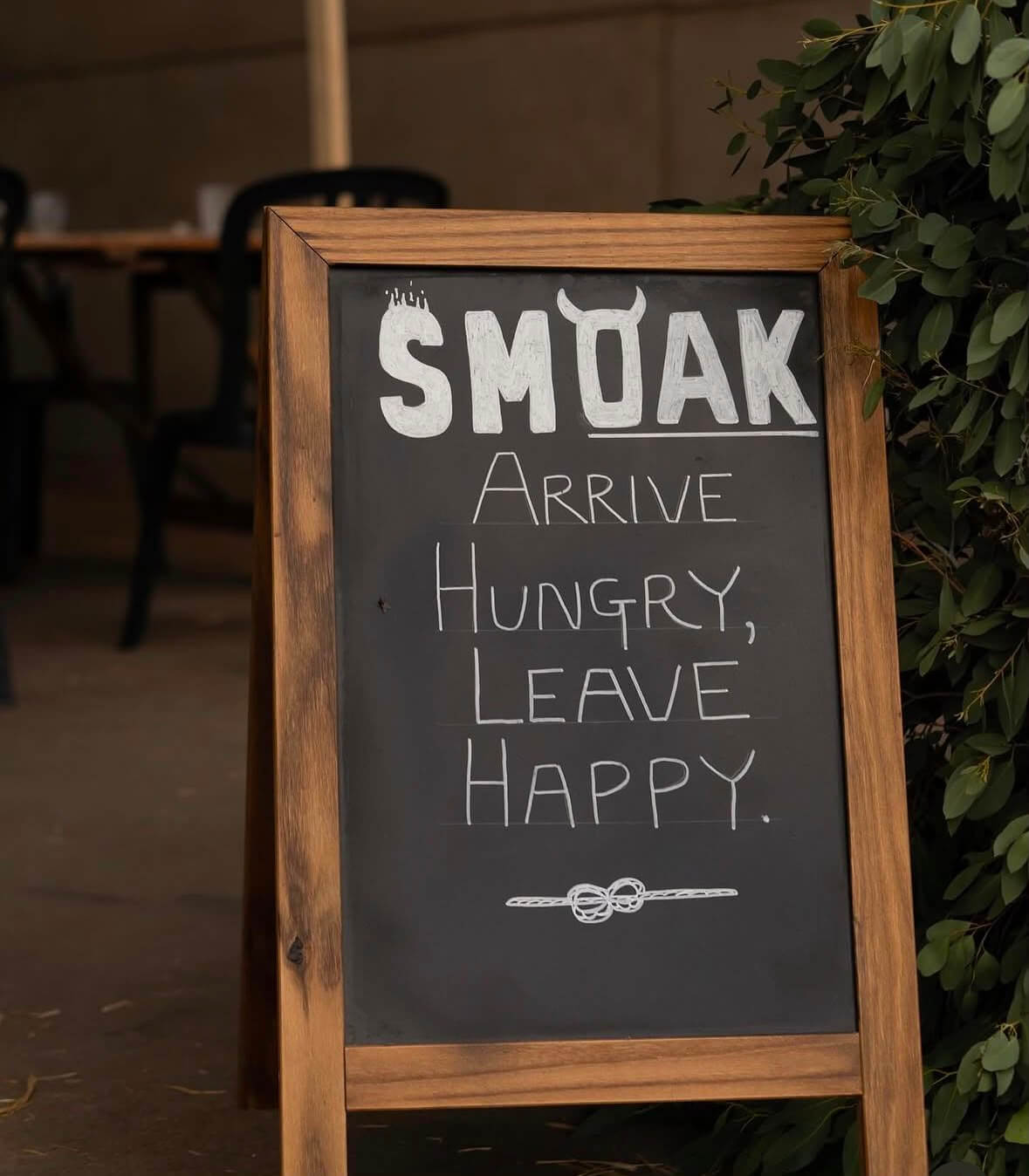 Arrive hungry, leave happy - the SmOak board outside the tipi
