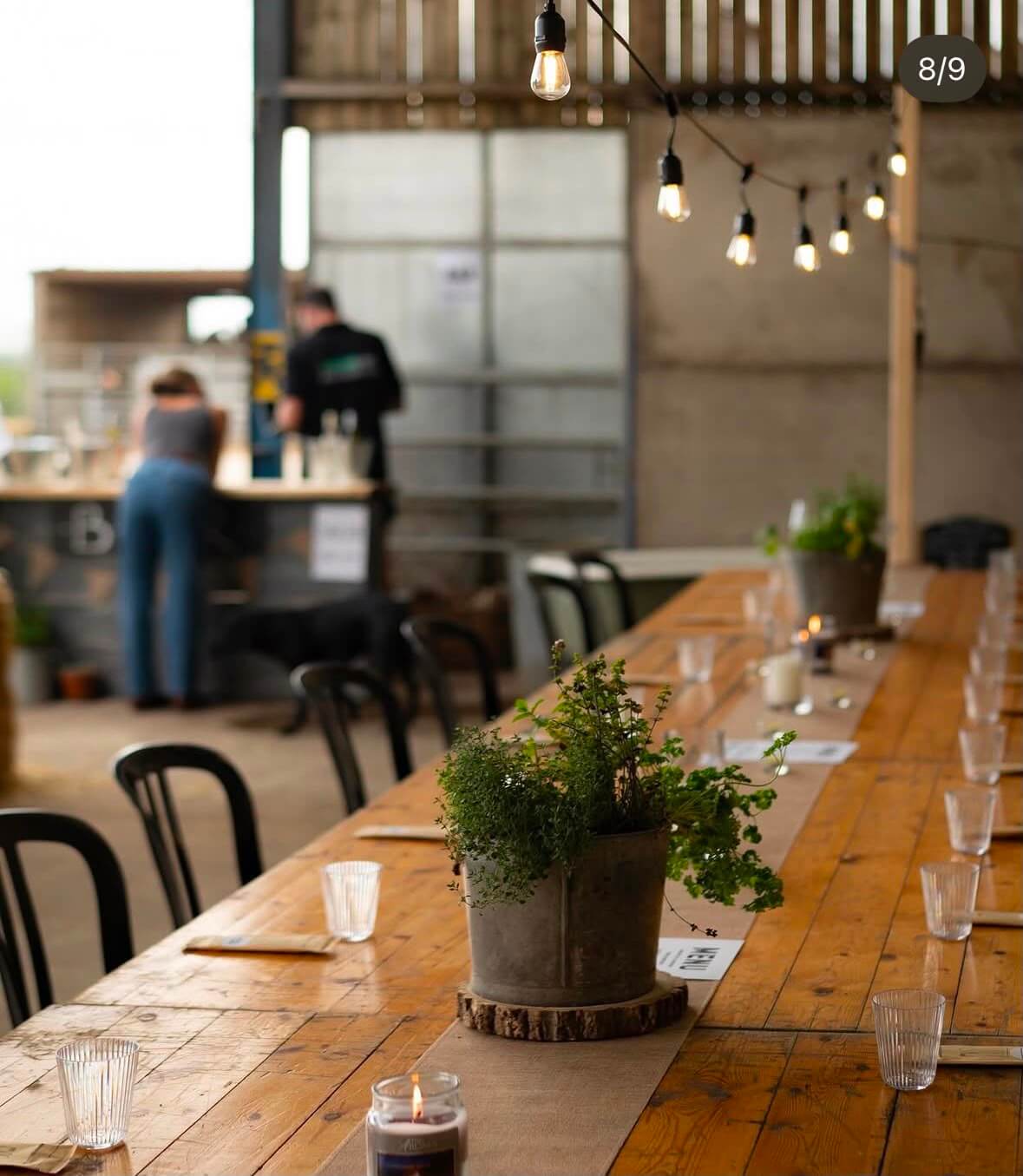 The long table set for a SmOak evening in the barn