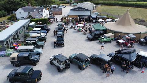 The Land Rover line-up in the yard
