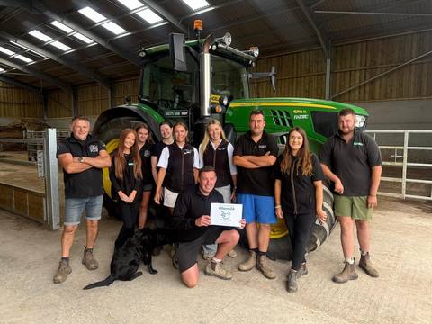 The Oakleys Farm team in front of the tractor