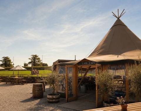 The tipi from across the field