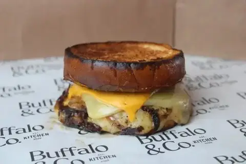 A cheese and onion toastie, cut through